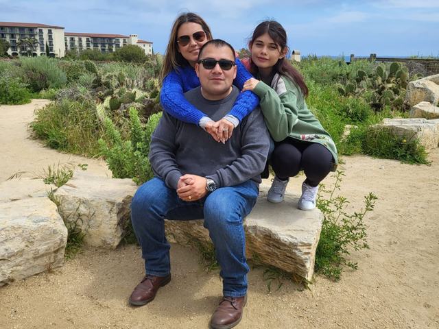 Roman Avalos, owner of Premier SoCal Security Screens, with his wife and daughter on a coastal trail