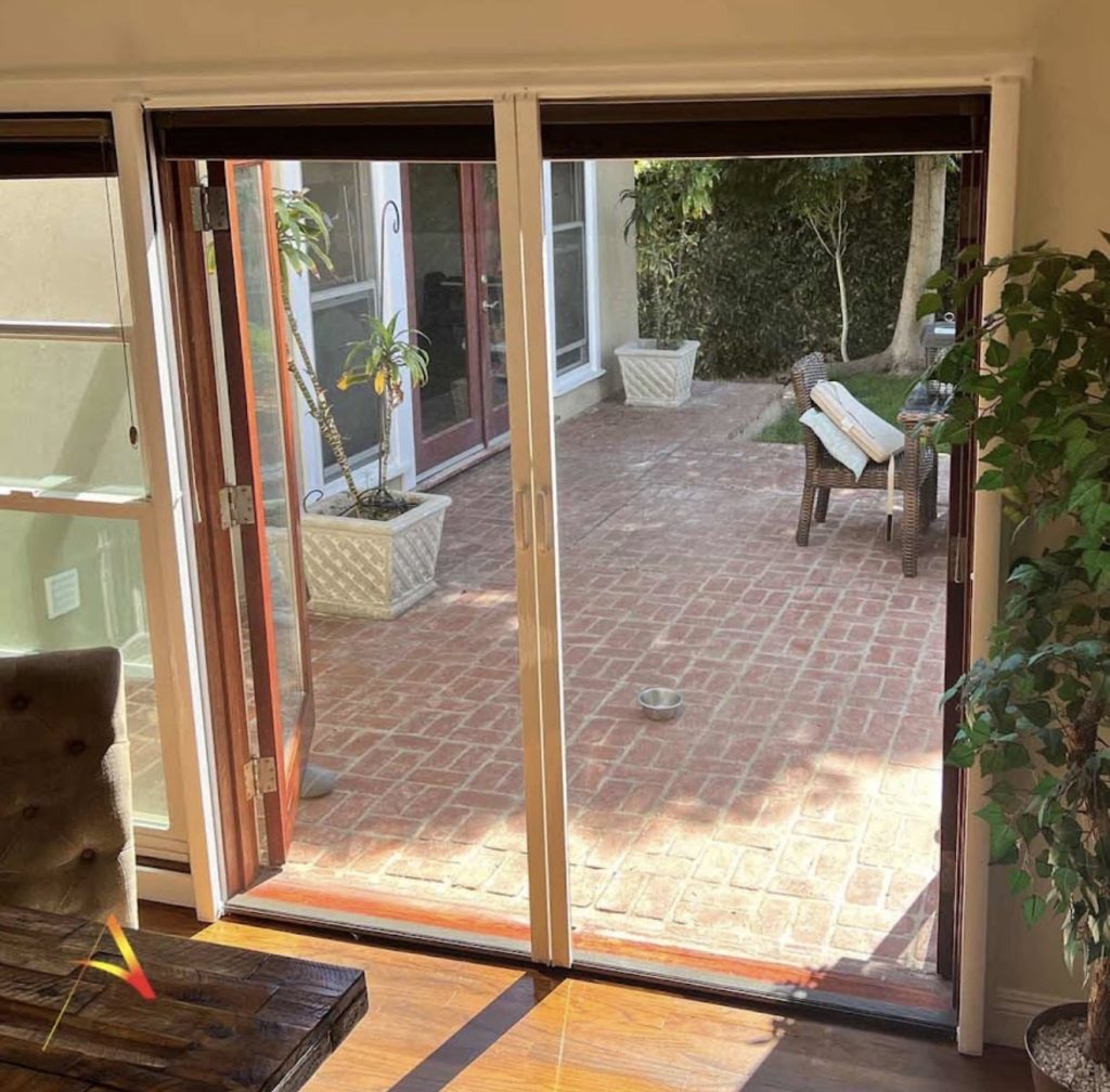 Sliding door retractable screens