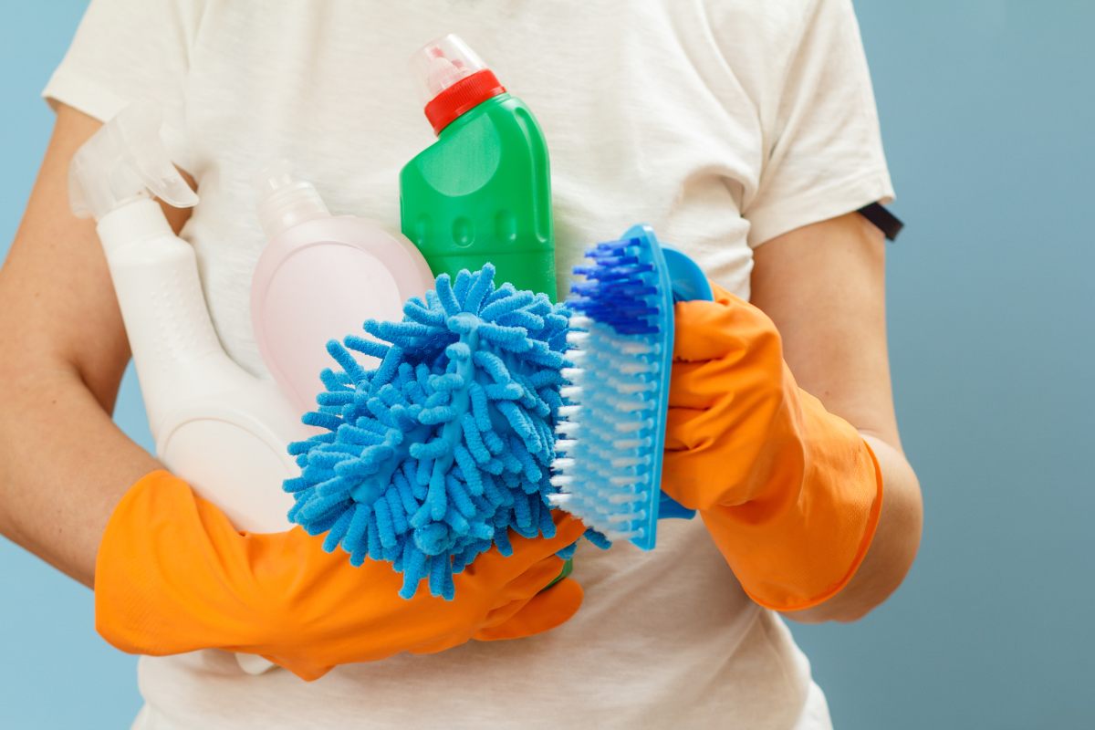 A person holding supplies to clean their security screens in Southern California.