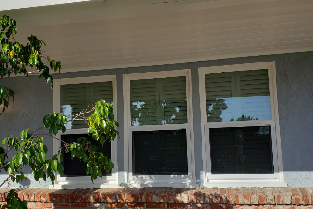 A home with protective security window screens providing home break-in prevention in Southern California.